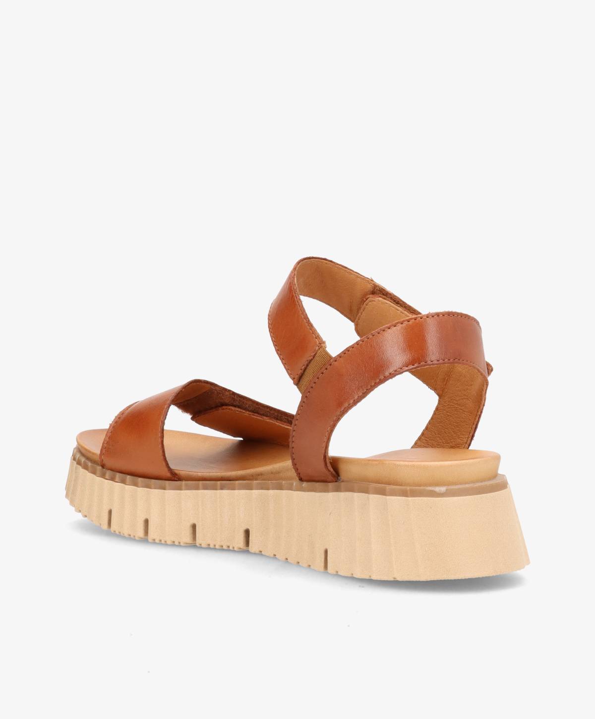 Brun lædersandal med tyk, rillet sål og åben tå.