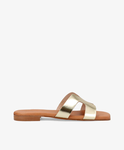 Skind slip-ins fra Shoedesign Copenhagen i guld.