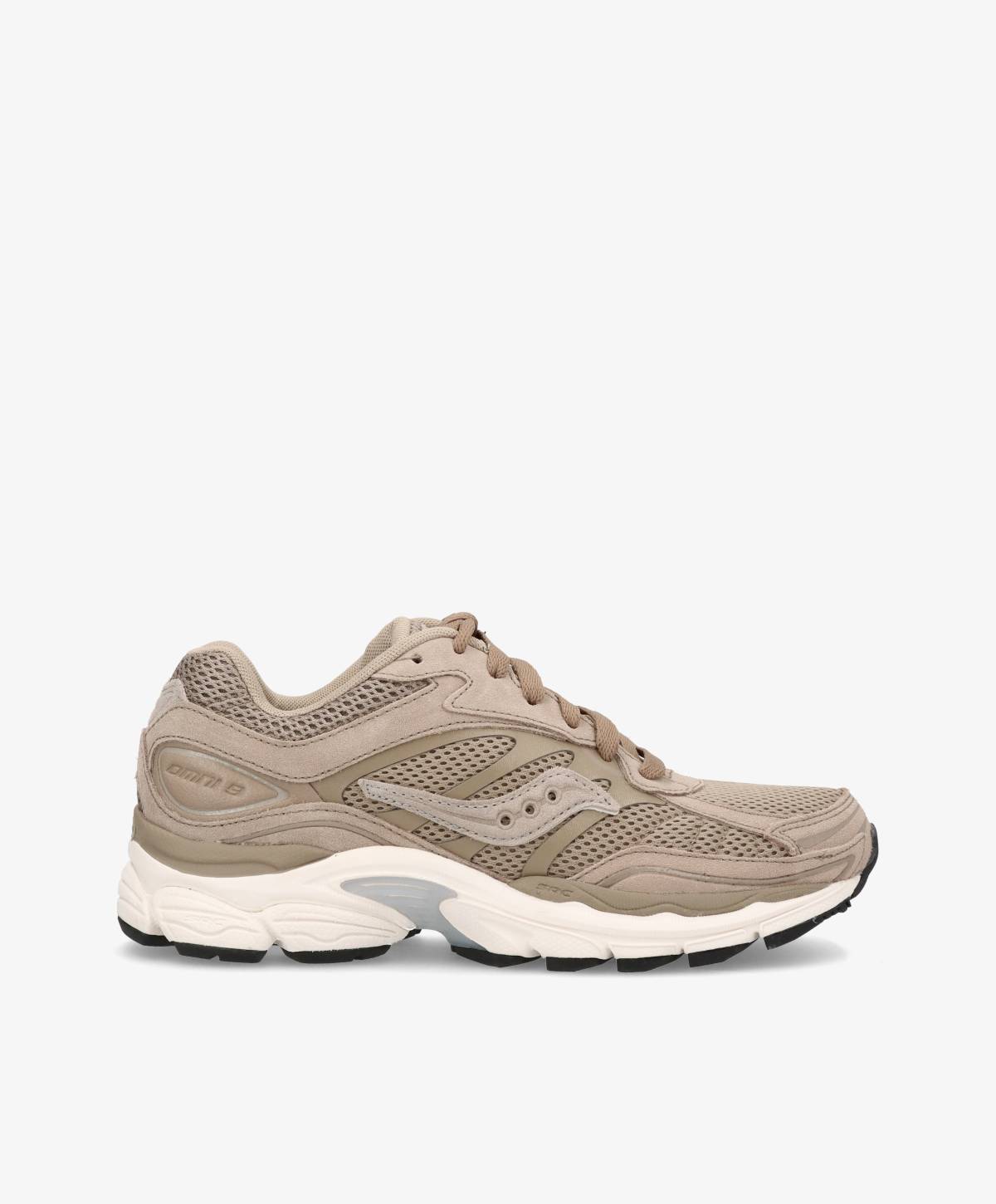 Beige Saucony sneakers med chunky, hvid bund og beige snørebånd.