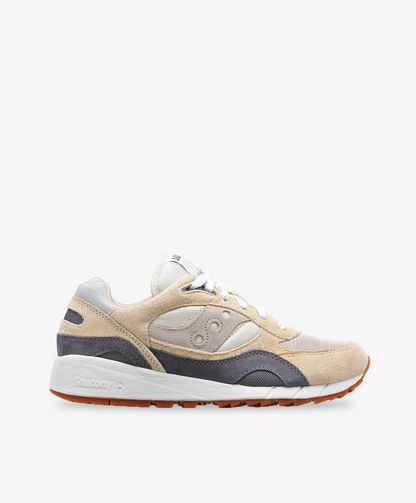 Saucony sneakers i beige med flerfarvede detaljer og chunky bund.