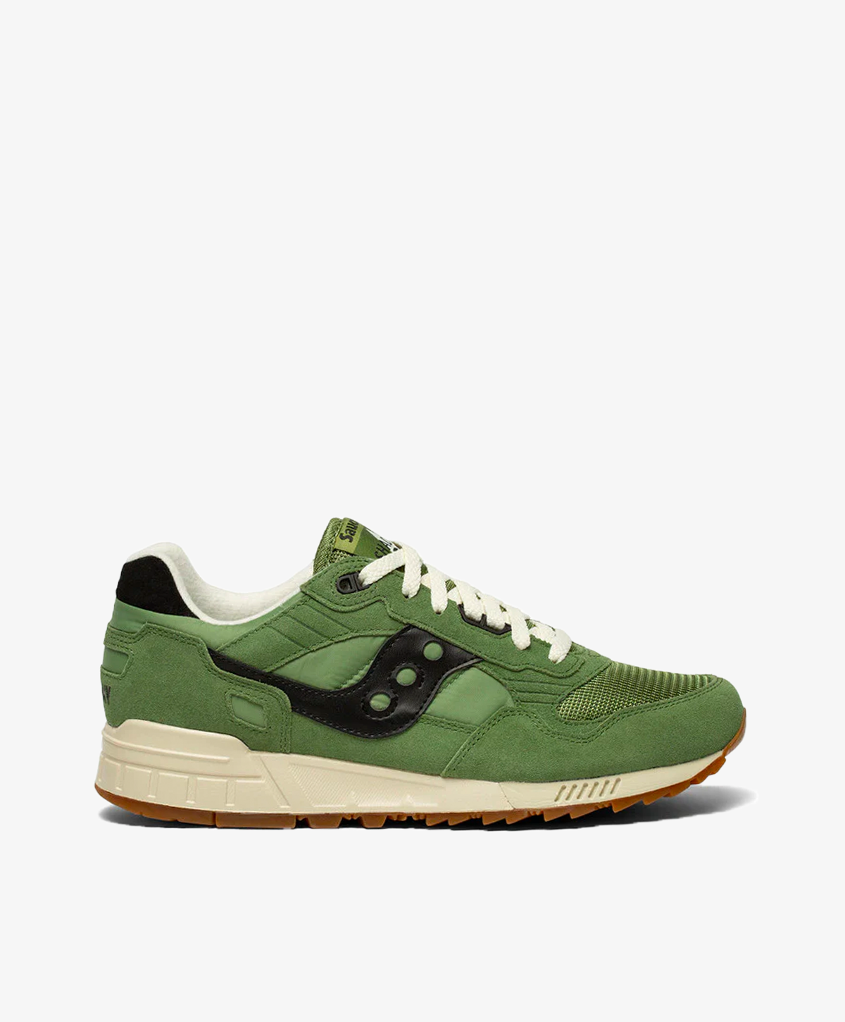 Grønne Saucony sneakers med sort hælkap og logo på siden.