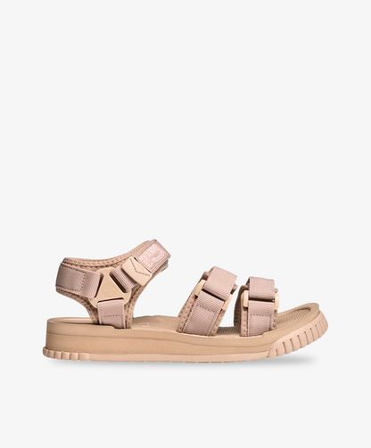 Beige Shaka sandaler med justerbare velcroremme.