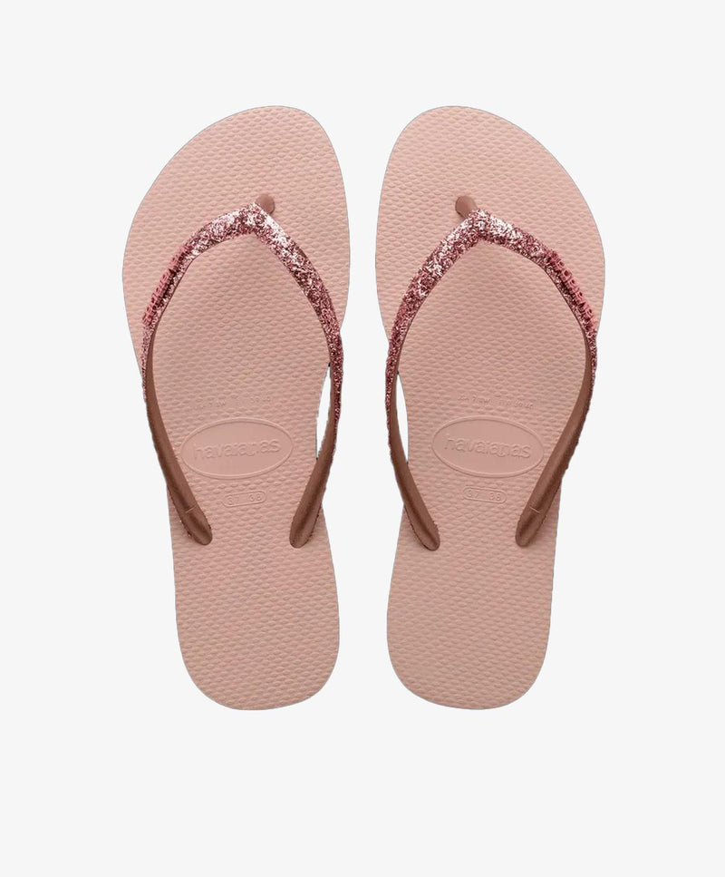 Lyserøde slip-in sandaler til kvinder med glitrende remme.
