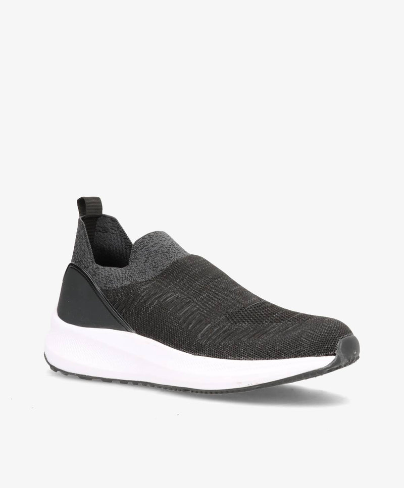 Sort slip-on herresko med hvid sål og grå detaljer, set fra siden.