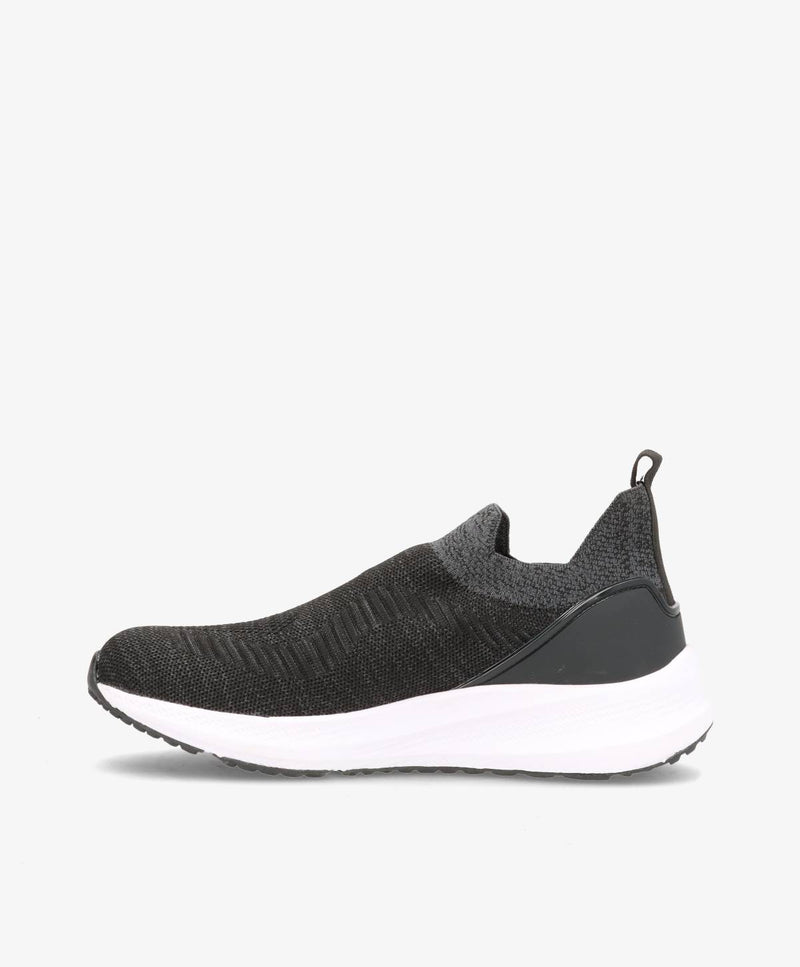 Sort slip-on herresko med hvid sål og grå detaljer, set fra siden.