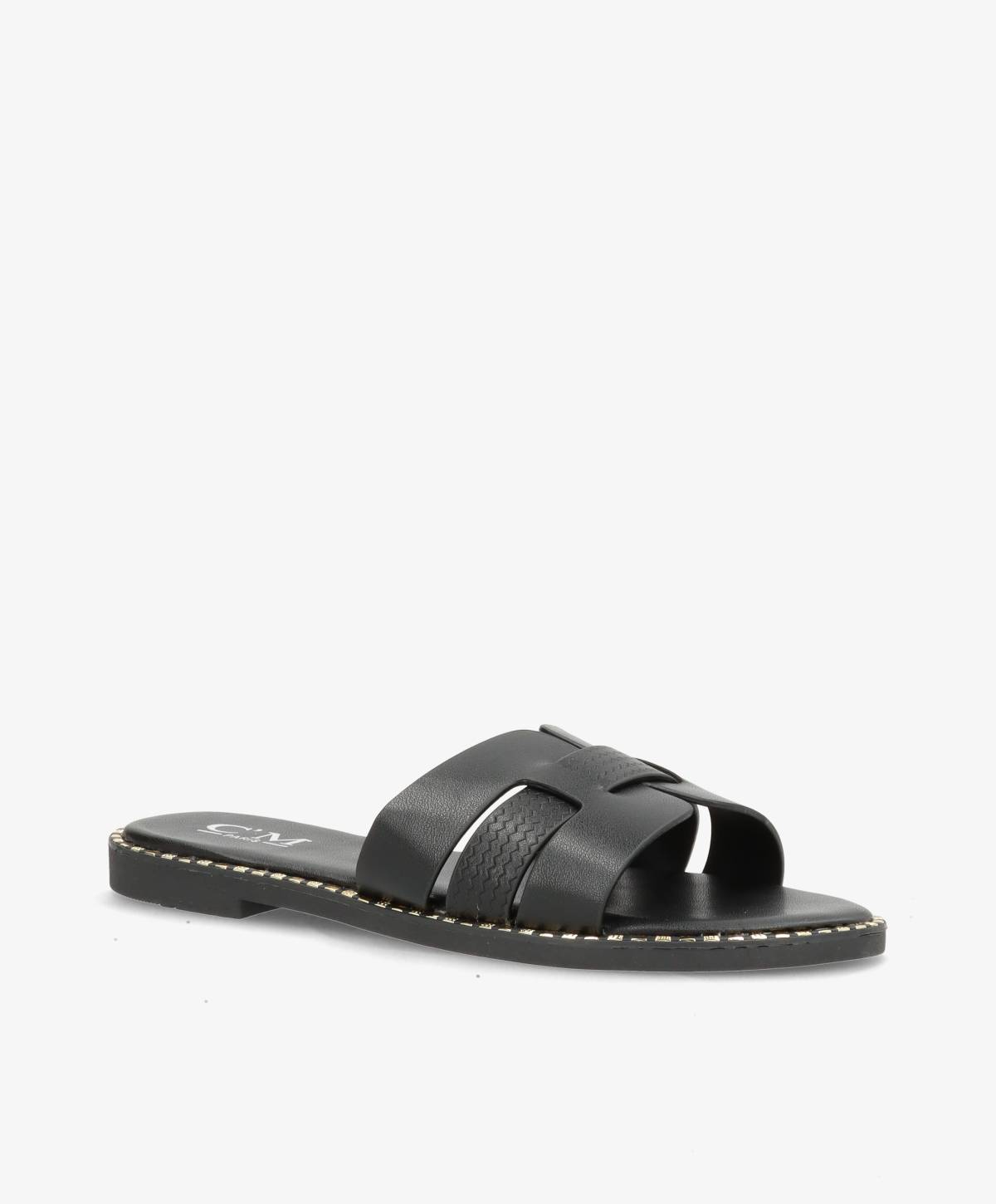 Sort slip-in sandal med flettede remme og flad sål.