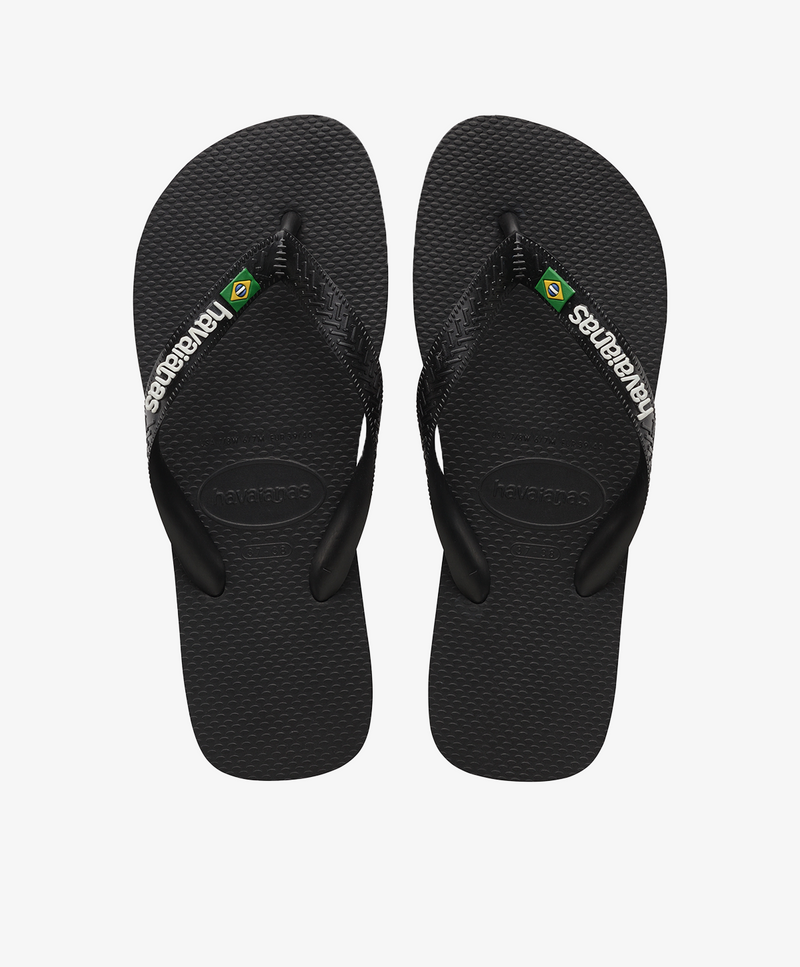 Sorte Havaianas slip-ins med logo og brasiliansk flag.