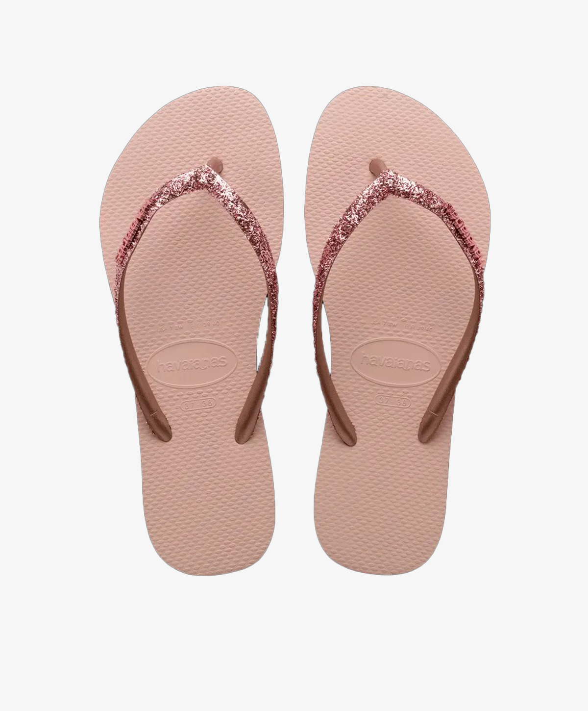 Lyserøde Havaianas slip-ins med glitterremme.